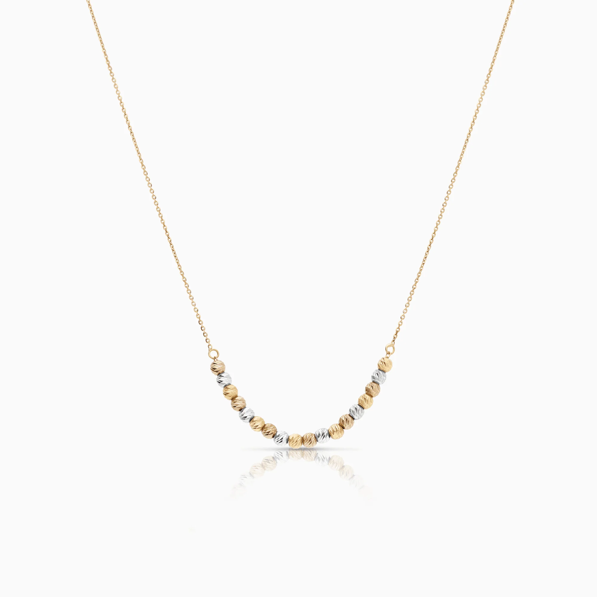 Gold necklace with beads 2.34g 18K yellow/rose/white gold