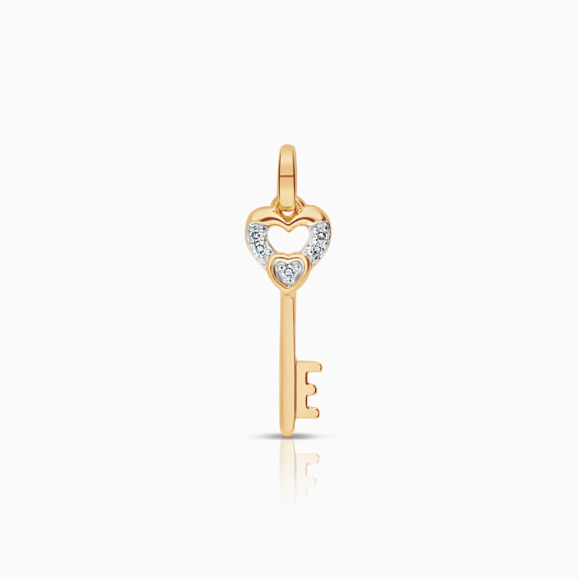 Gold pendant key 0.52g 18K gold