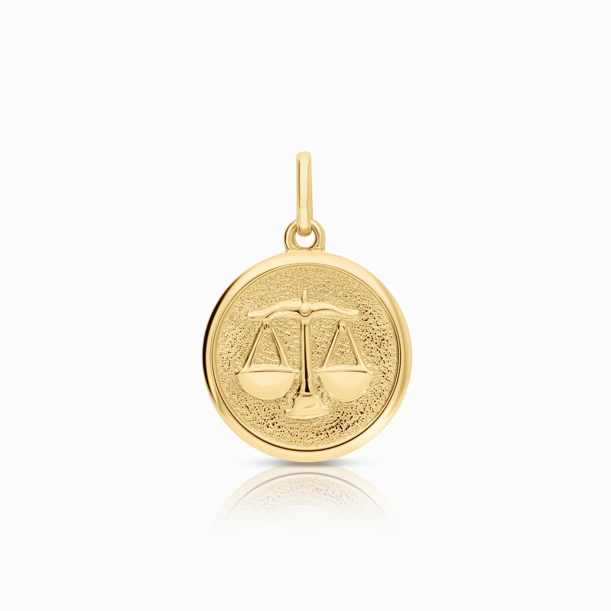 Libra pendant 2.34g 18K gold