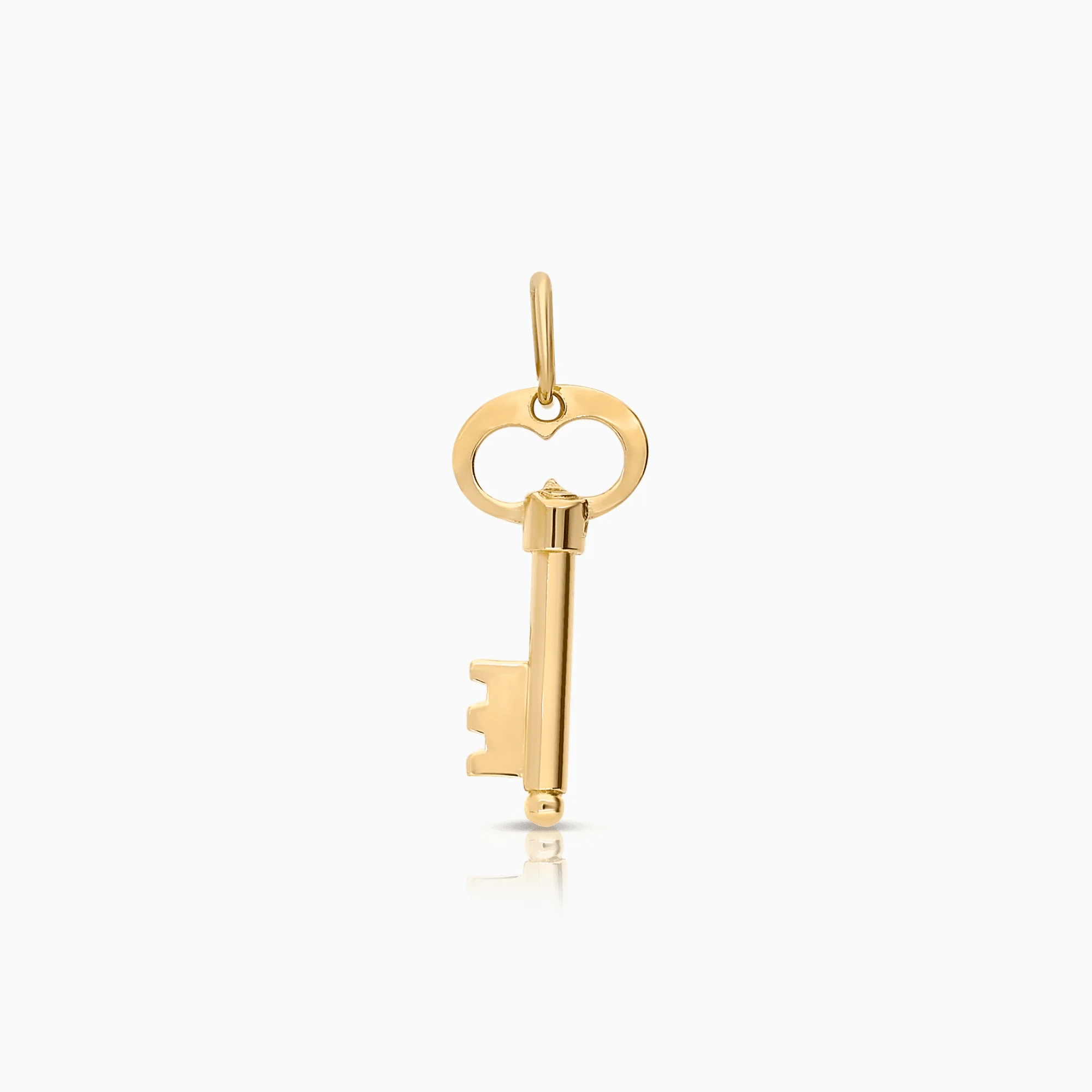 Key pendant 0.64g 18K gold