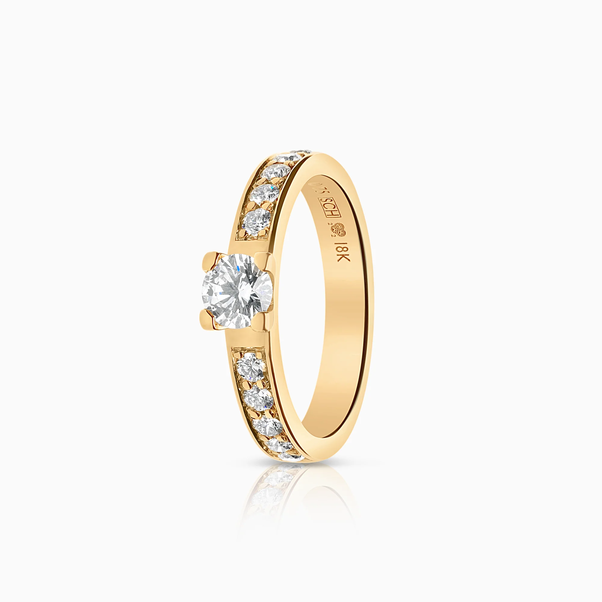 Side stone ring 0.75ct 18K gold