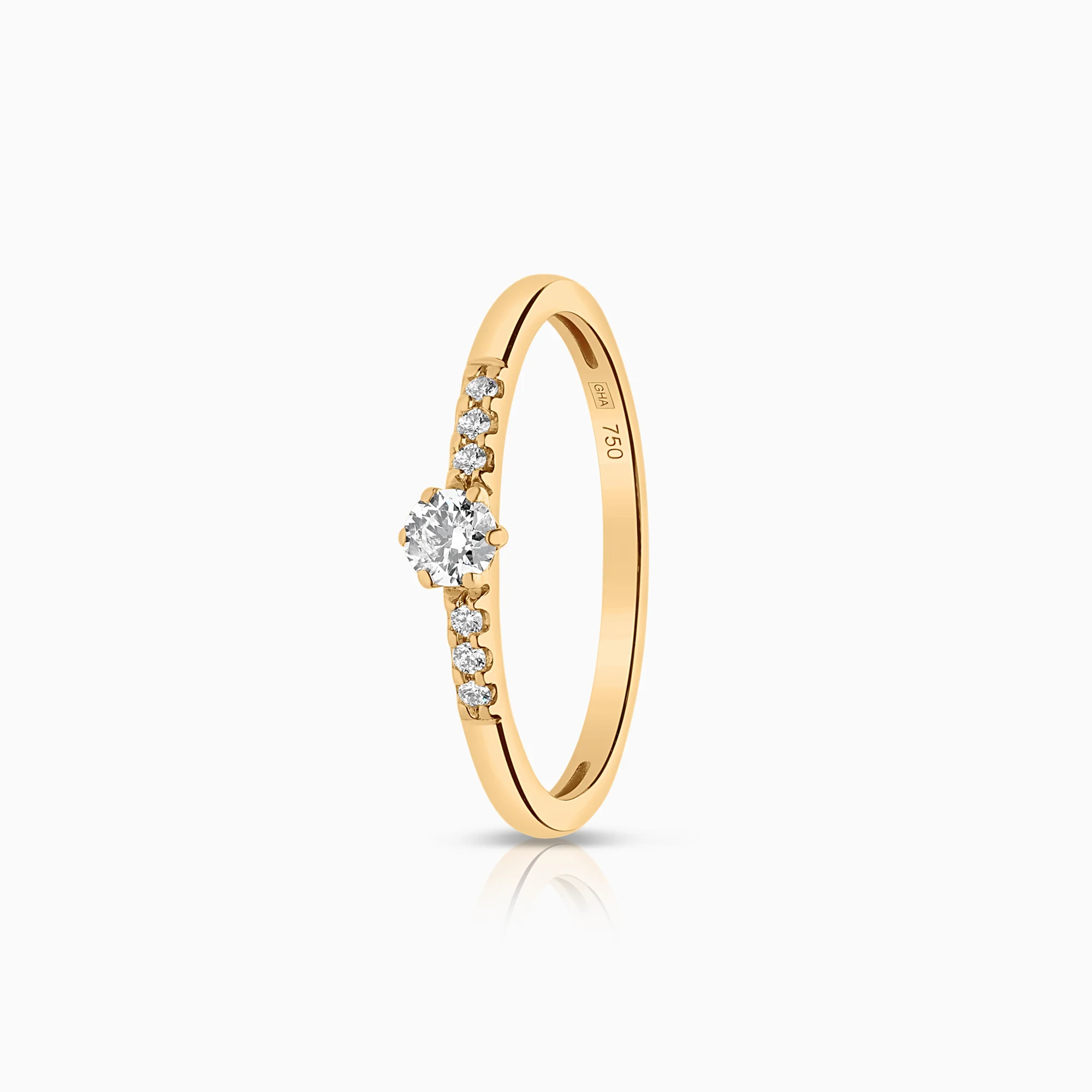 Side stone ring 0.15ct 18K gold