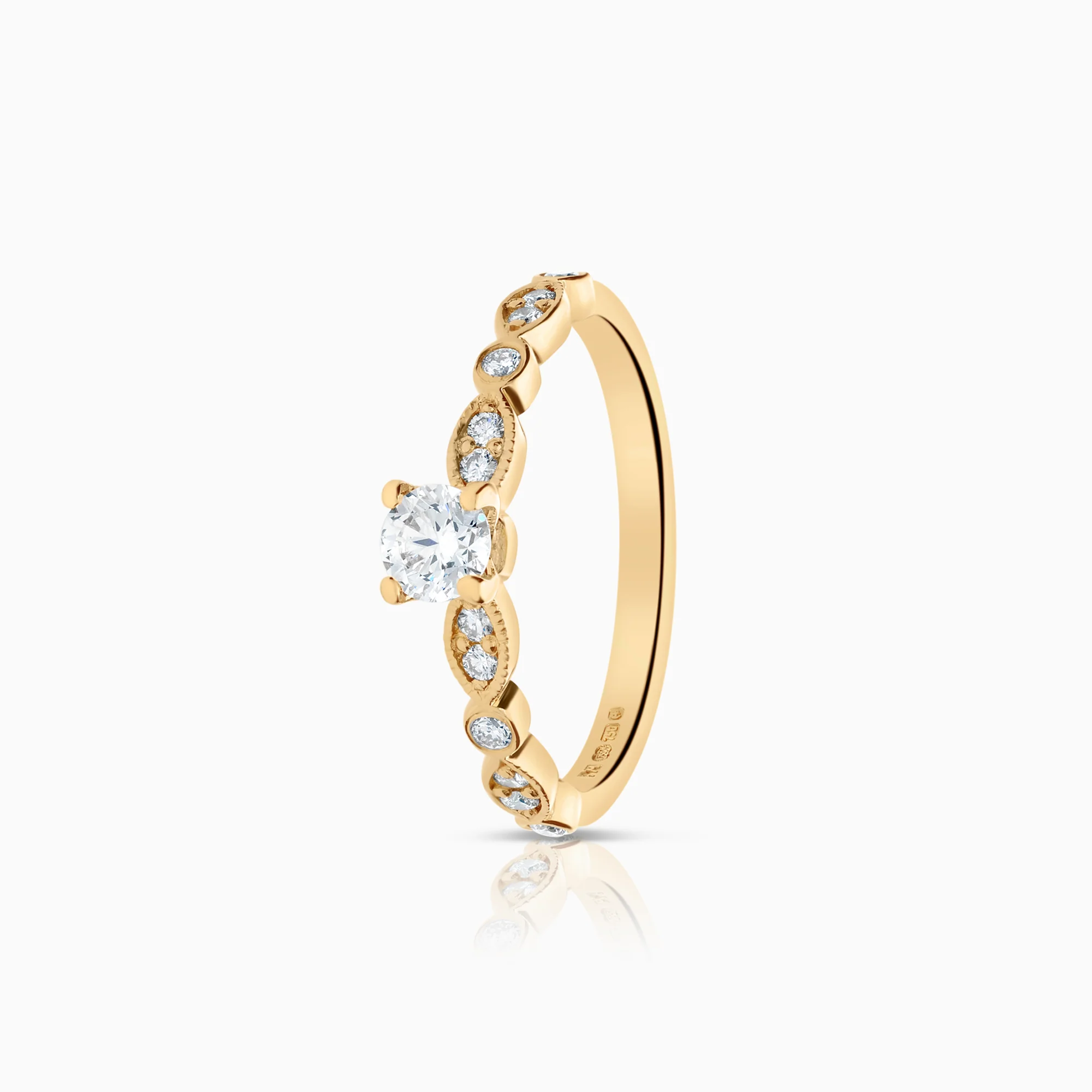 Side stone ring 0.40ct 18K gold
