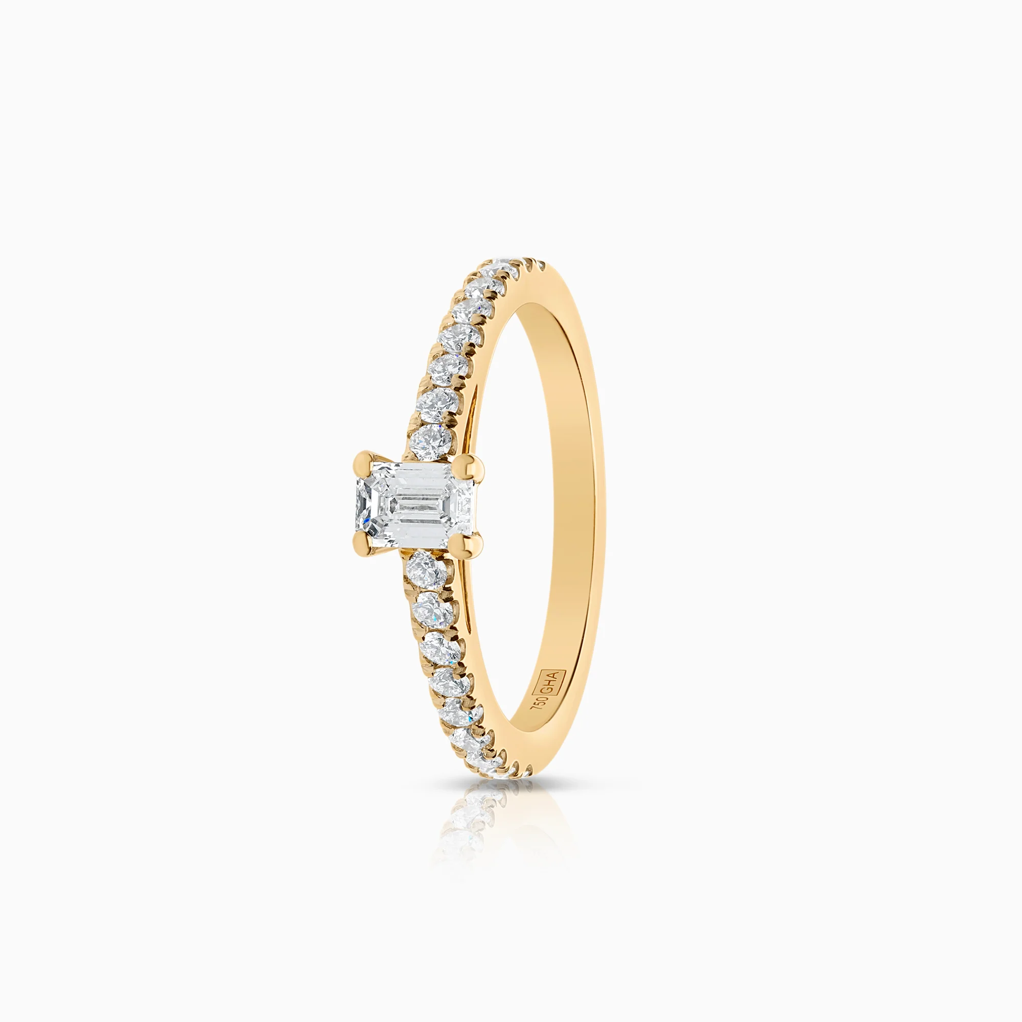 Side-stone ring 0.61ct 18K gold