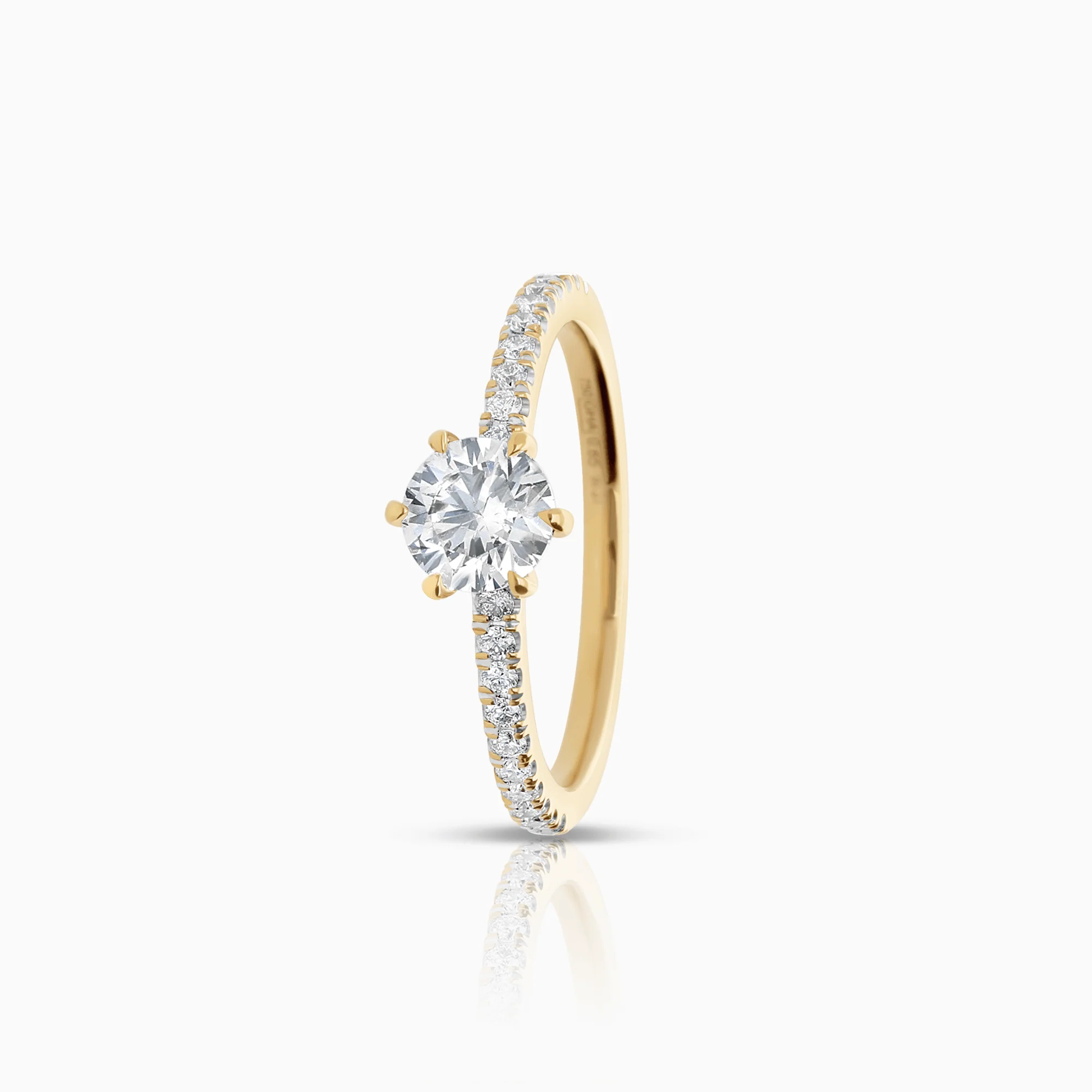 Side stone ring 0.65ct 18K gold