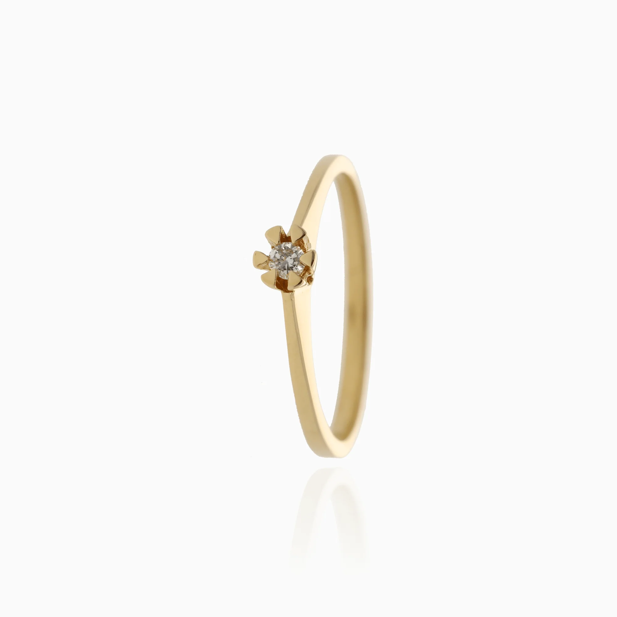 Solitaire ring 0.04ct 18K